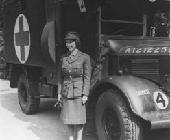 Princess Elizabeth of Windsor in front of her ambulance